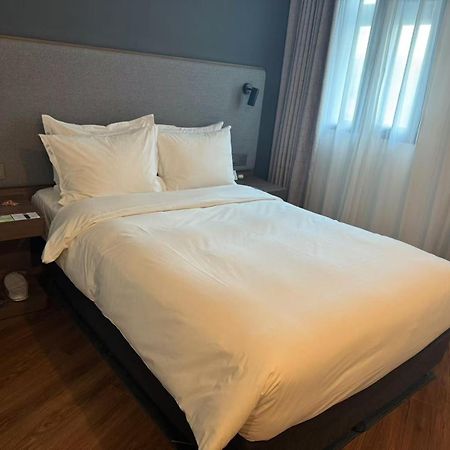 Holiday Inn Express Qingdao City Center By Ihg Exterior foto